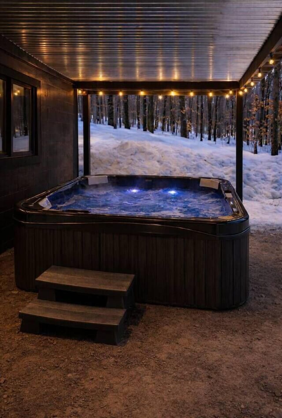 Steam, snow, and string lights. ✨ Our private 6-person hot tub is the perfect spot to unwind after a day on the slopes.