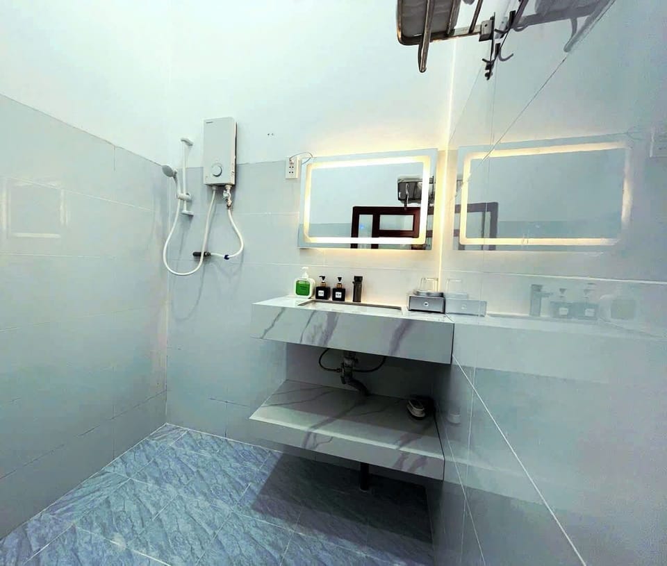 Shower, hydromassage showerhead, designer toiletries, hair dryer