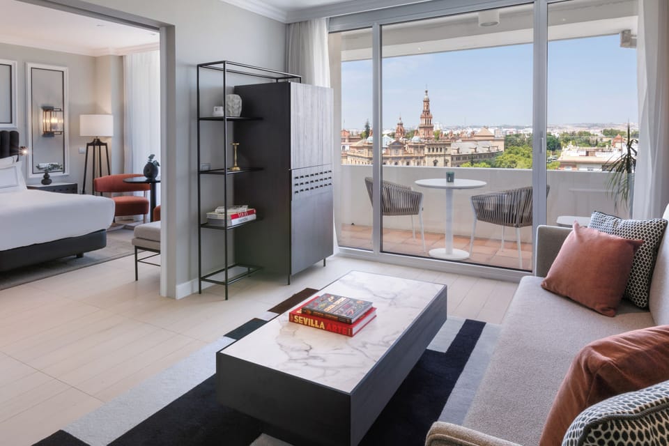 The Level, Suite, Terrace | Living area | 45-inch flat-screen TV with satellite channels, TV