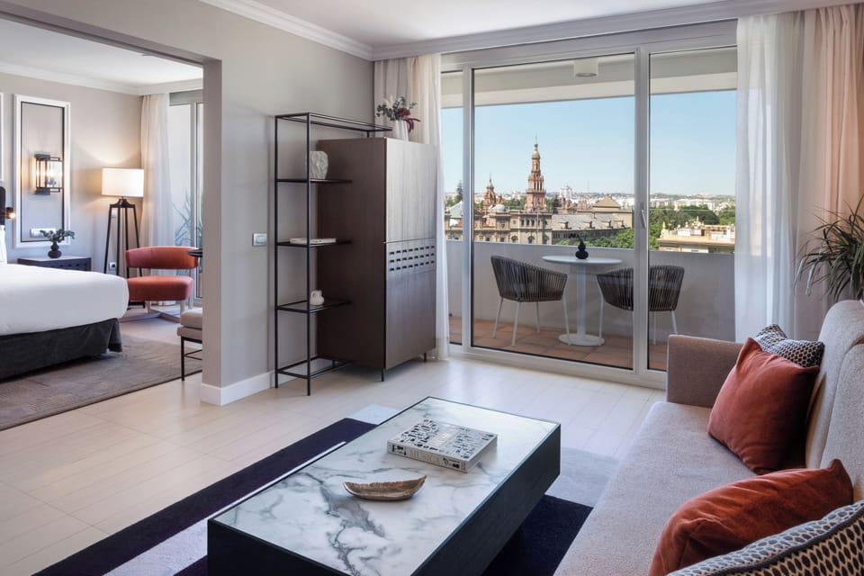 The Level, Suite, Terrace | Living area | 45-inch flat-screen TV with satellite channels, TV