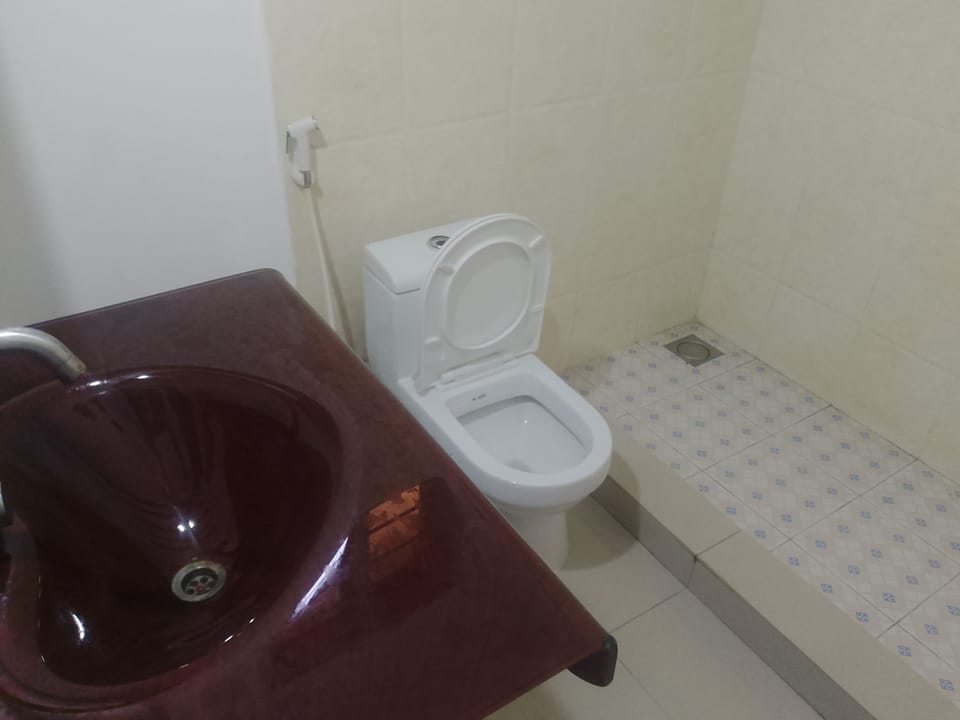 Family Triple Room, Pool View | Bathroom | Shower, slippers, towels, soap