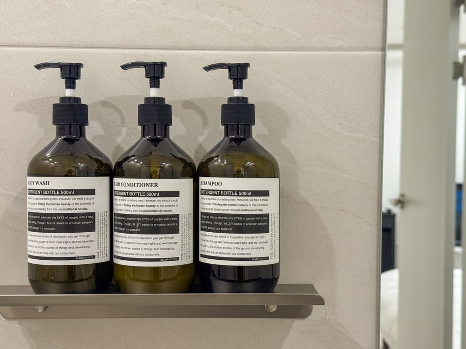 Grand Triple Room, Non Smoking, Corner | Bathroom | Shower, designer toiletries, hair dryer, towels