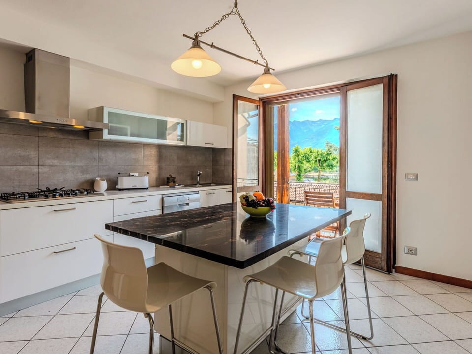 Furniture, Interior Design, Flooring, Kitchen, Countertop, Chair, Wood, Kitchen & Dining Room Table, Table, Floor