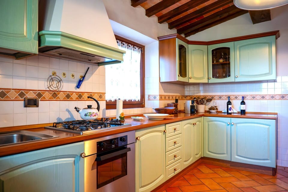 Kitchen, Countertop, Kitchen Appliance, Interior Design, Major Appliance, Wood, Cabinetry, Kitchen Stove, Flooring, Furniture