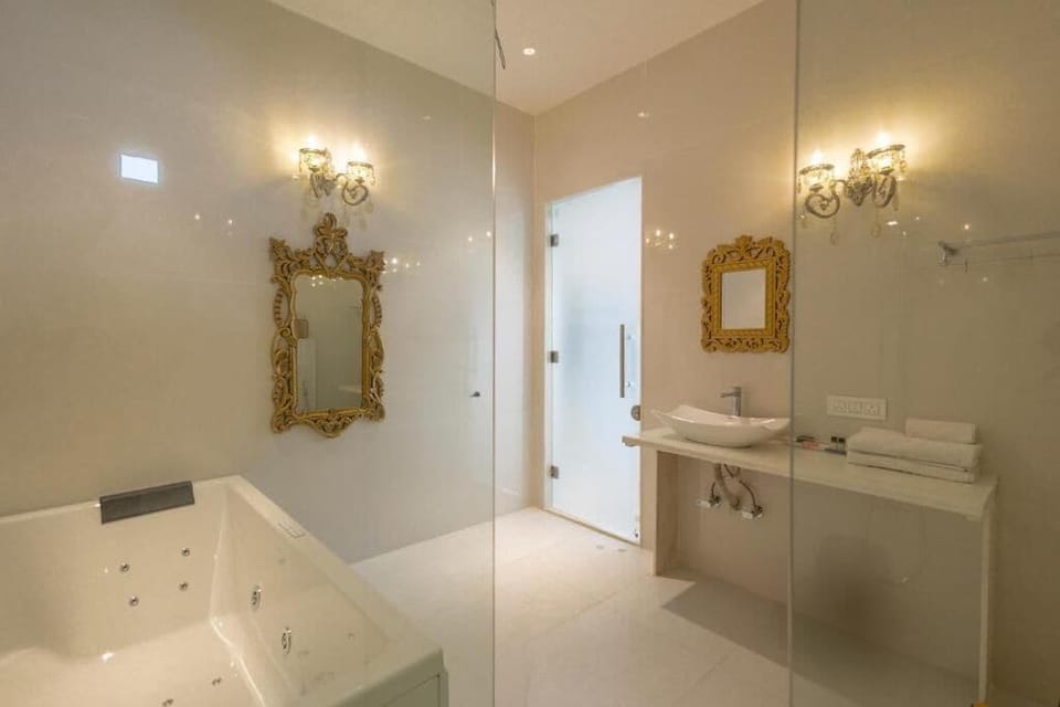 Shower, free toiletries, hair dryer, bathrobes