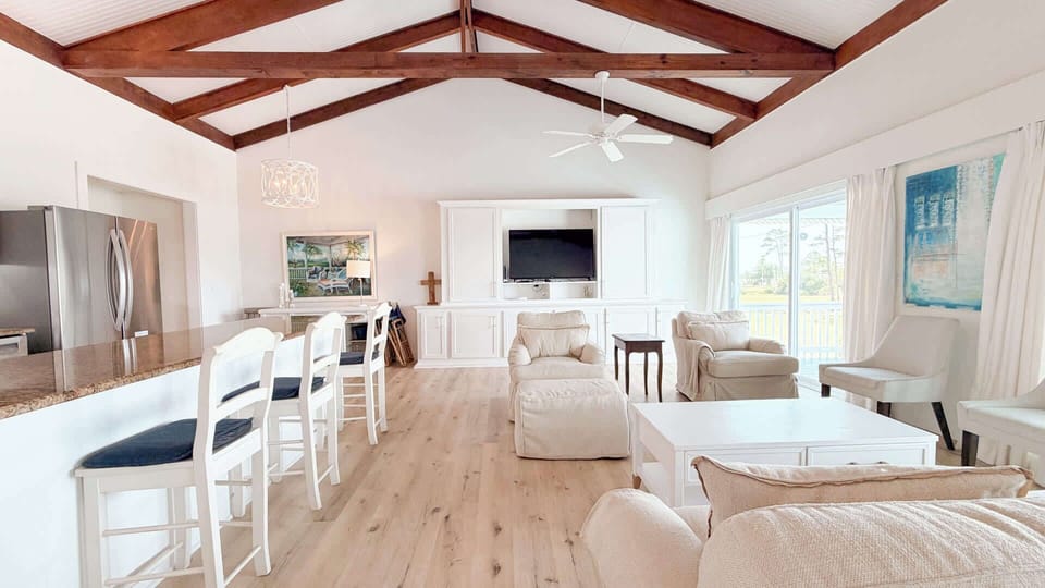 The open living + kitchen area features lots of open space to keep the conversation vibes flowing. 