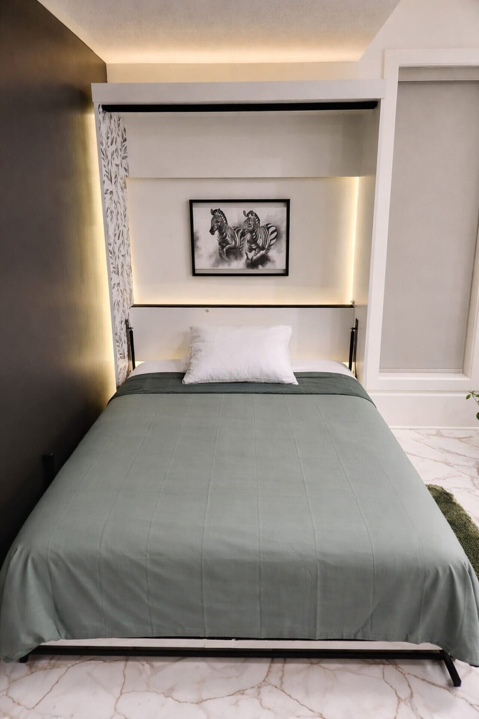 Sleek modern bedroom with muted tones