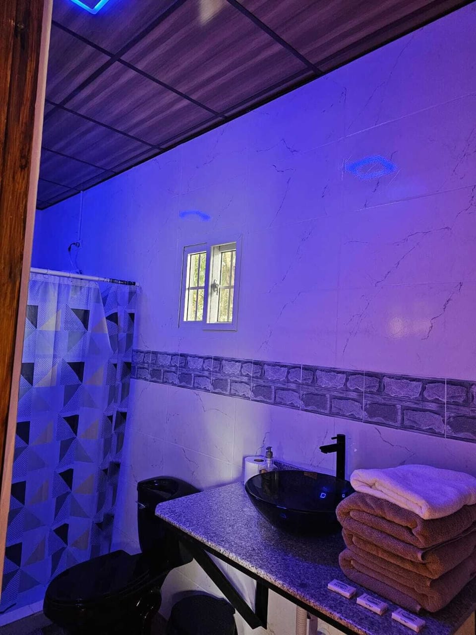 Shower, towels, soap, shampoo