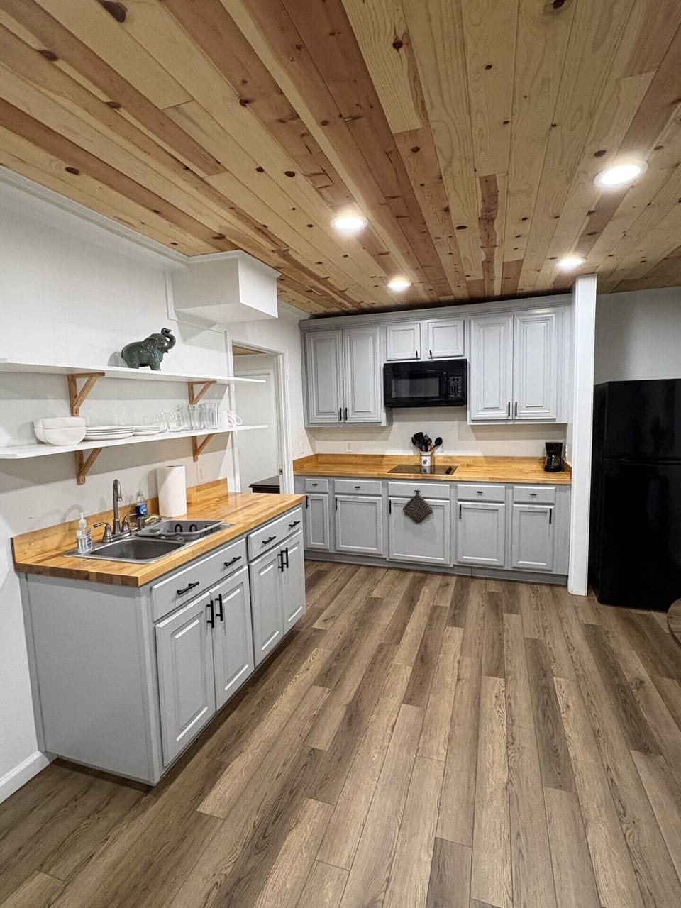 Sink, cook top, microwave, and refrigerator