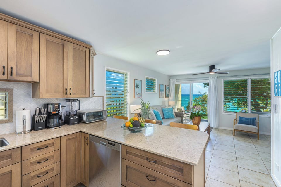 Living area from the kitchen - the ocean is right there  