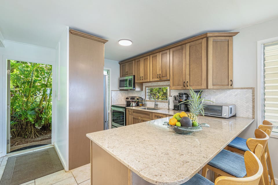 Fully equipped elegant modern kitchen. New matching small appliances.  