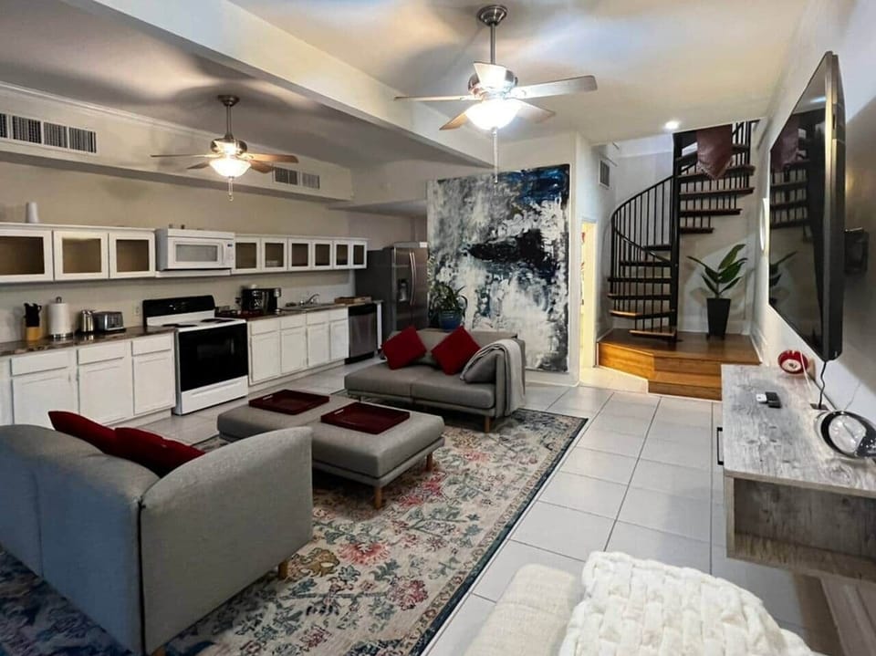View of living room and kitchen galley