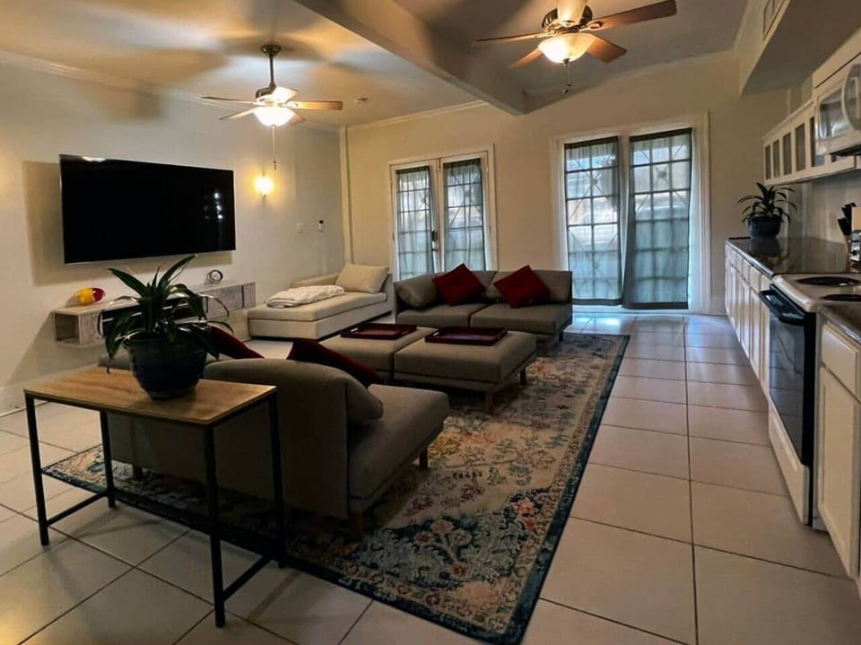 View of living room and kitchen galley