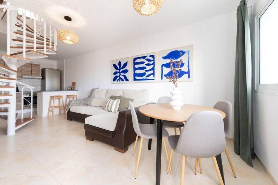 Deluxe Apartment, Balcony | Living area | 32-inch flat-screen TV with cable channels