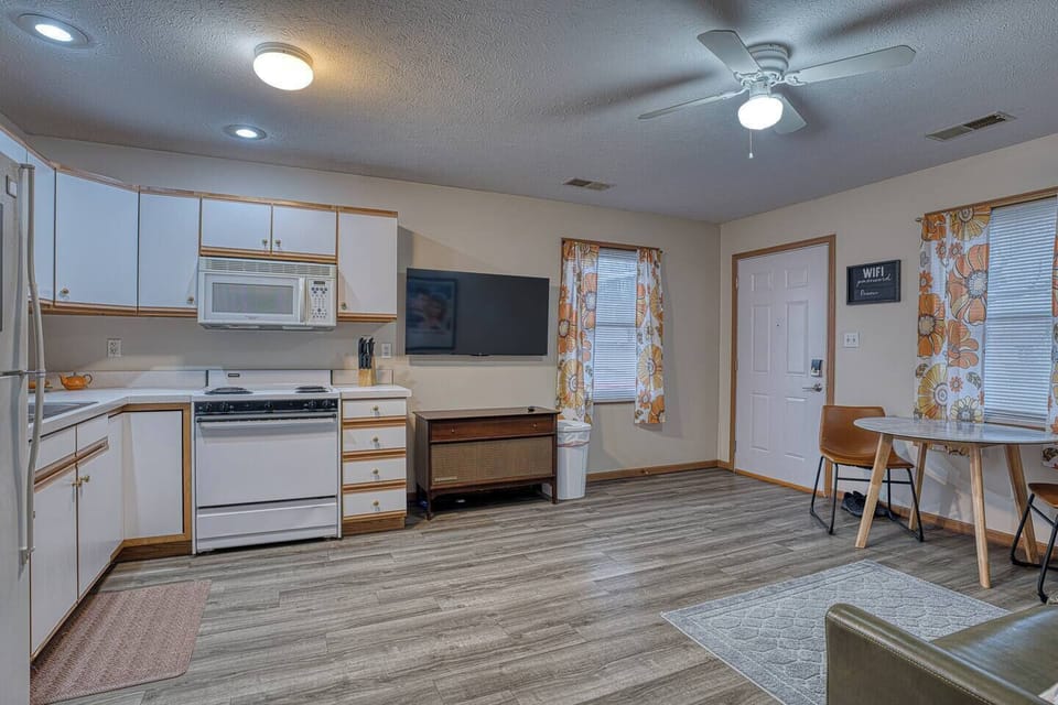 Fully equipped kitchen with full‑size appliances, cookware, and coffee essentials — everything you need for extended stays or home‑cooked meals.