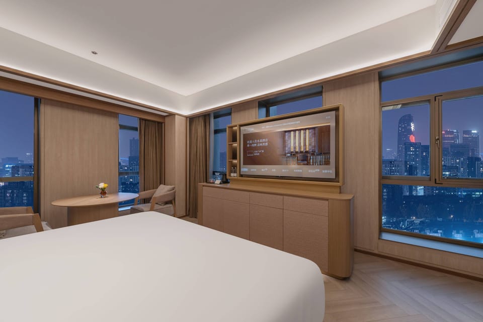 Deluxe Double Room, City View | Down comforters, minibar (free items), laptop workspace, blackout drapes