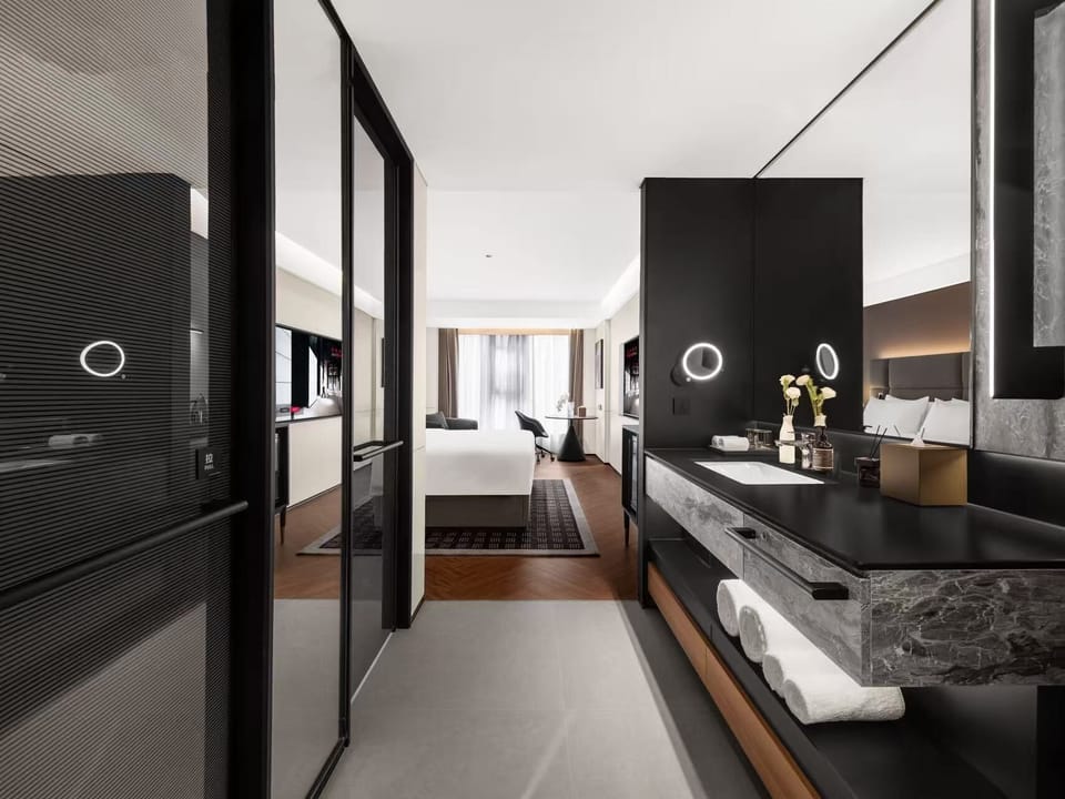 Premium bedding, memory foam beds, minibar (free items), desk