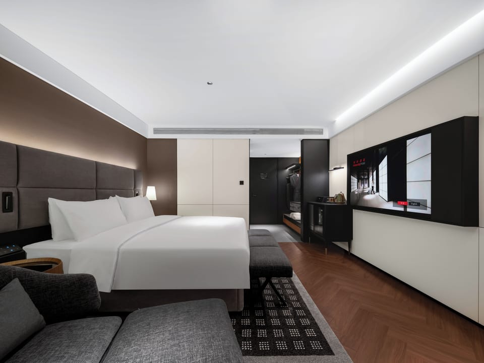 Premium bedding, down comforters, memory foam beds, minibar (free items)
