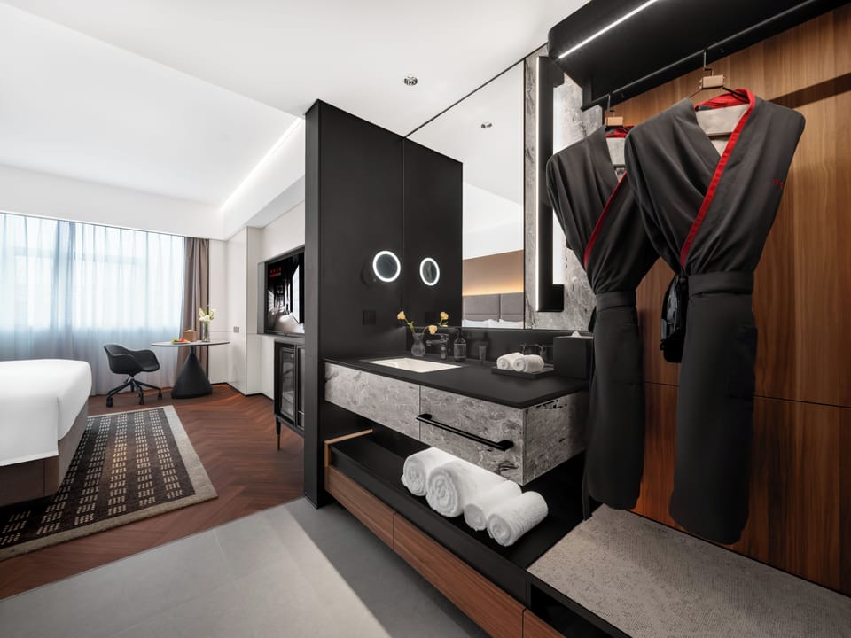 Basic Single Room | Premium bedding, down comforters, memory foam beds, minibar (free items)