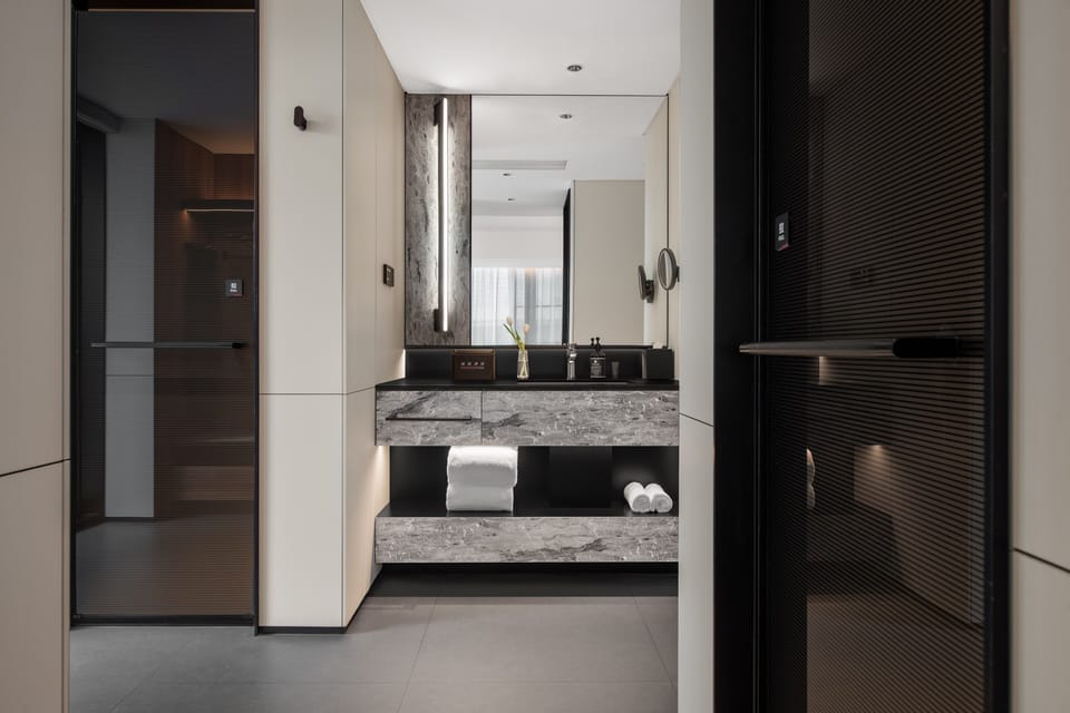 Comfort Double Room, City View | Bathroom | Designer toiletries, hair dryer, bathrobes, slippers