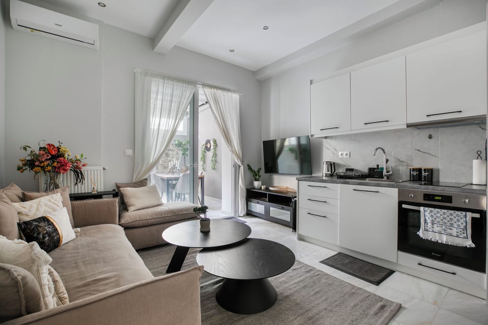 Deluxe Apartment, 2 Bedrooms, Kitchen, City View | Living room | 51-inch Smart TV with cable channels, Netflix, streaming services