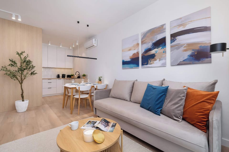 The well-designed combination of kitchen and lounge creates a convenient space for spending time together.