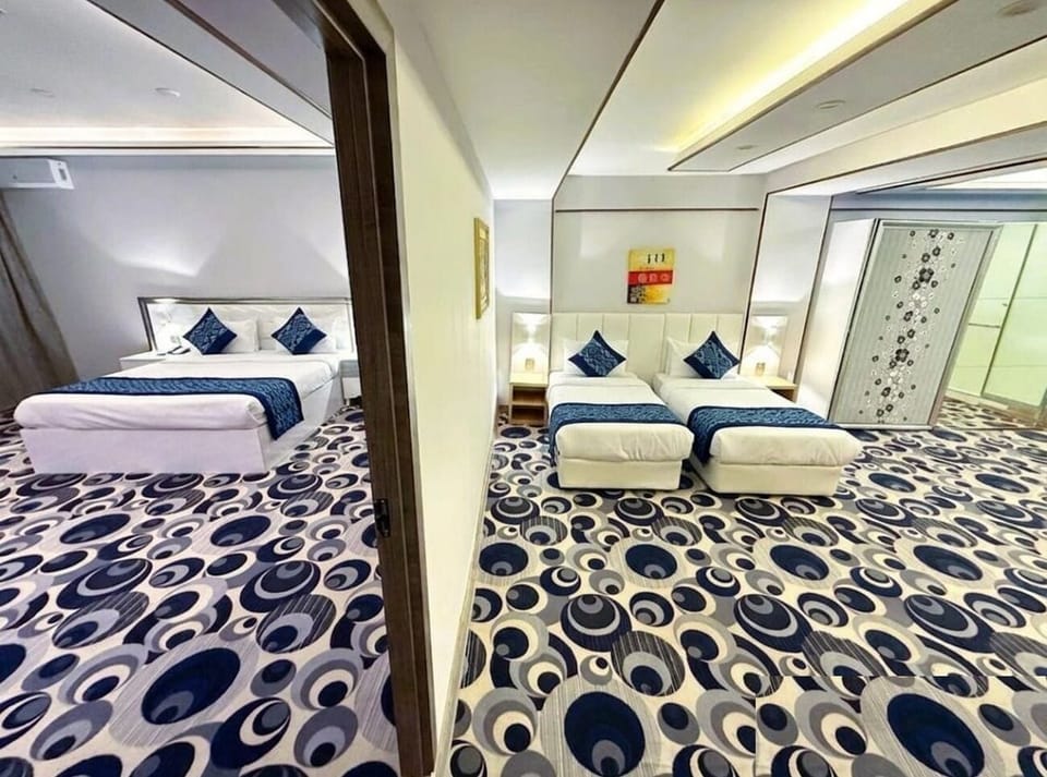 Premium bedding, desk, laptop workspace, soundproofing