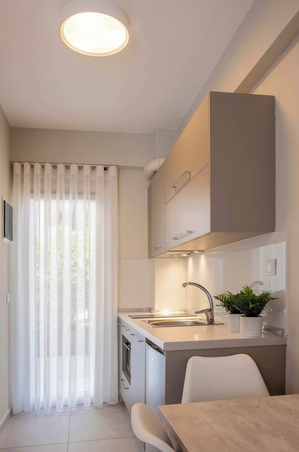 Functional kitchenette with modern appliances and everything needed for your stay.