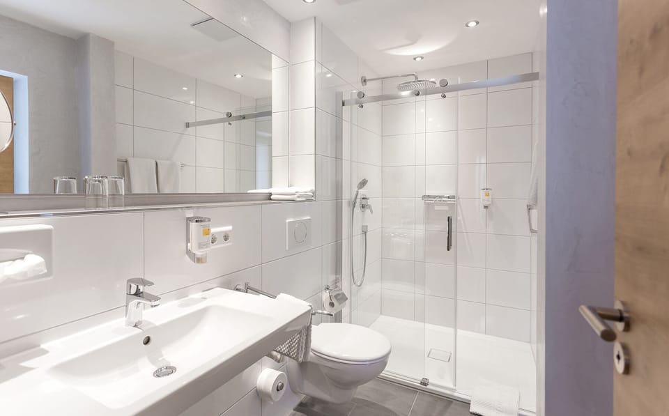 Eco-friendly toiletries, hair dryer, towels, soap