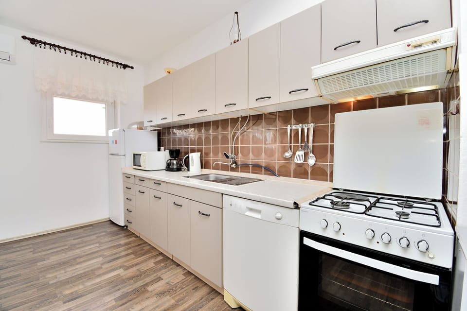 Apartment (A1) | Private kitchen | Espresso maker, fridge, microwave, oven
