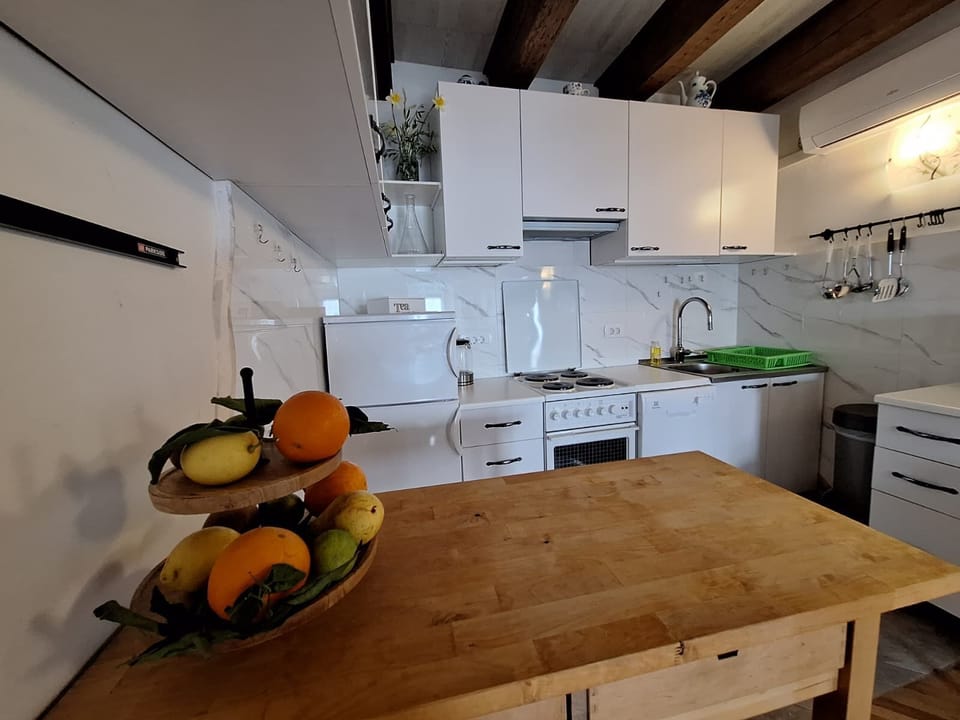Apartment (A1) | Private kitchen | Espresso maker, fridge, microwave, stovetop