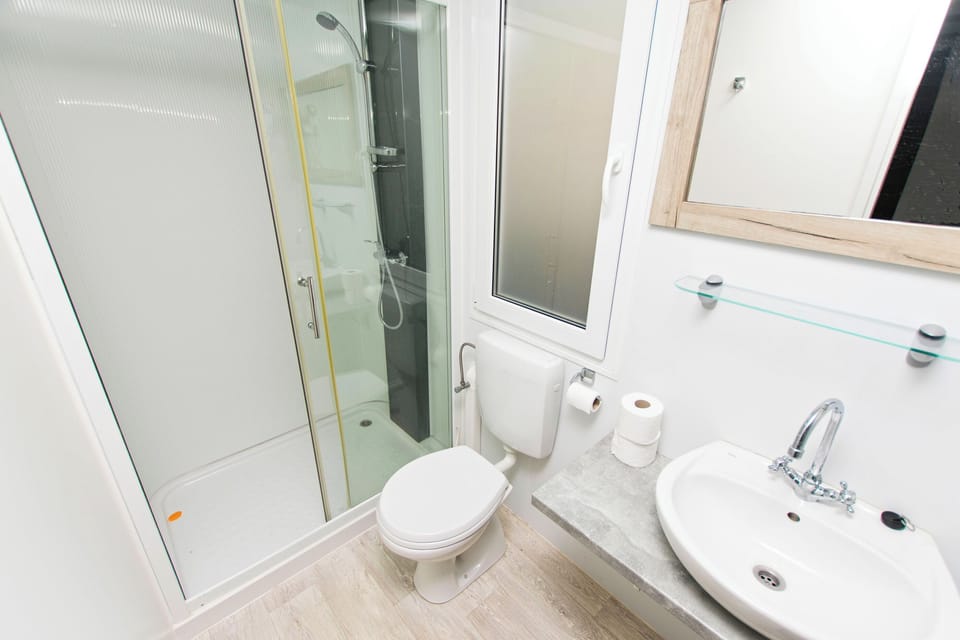 Apartment (A1) | Bathroom | Shower, towels, toilet paper