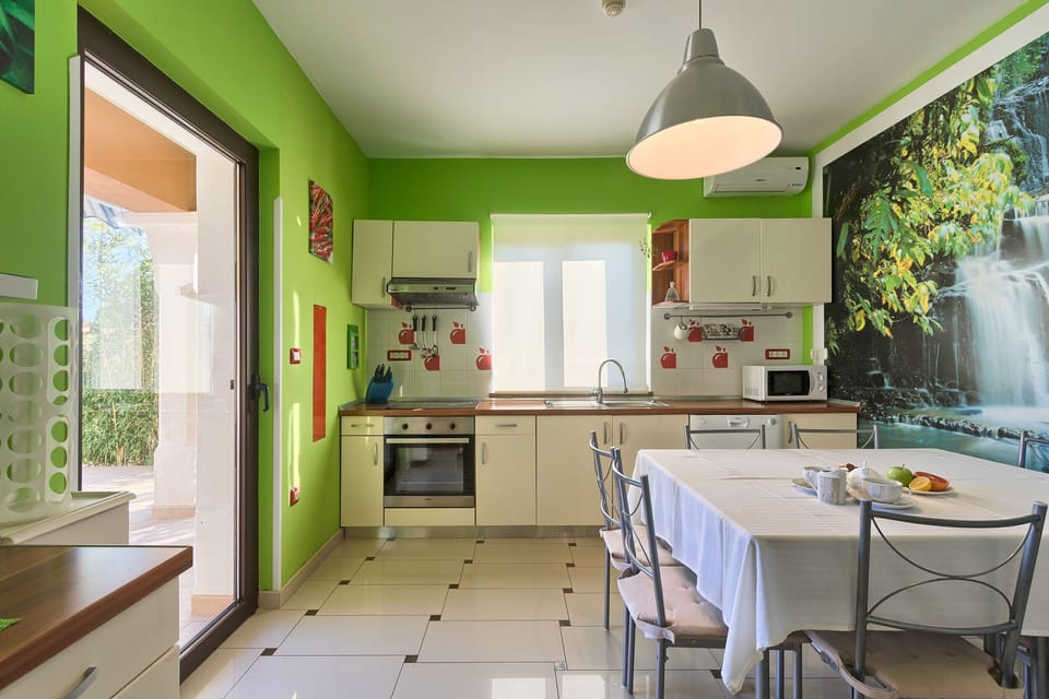 Villa | Private kitchen | Fridge, microwave, oven, stovetop