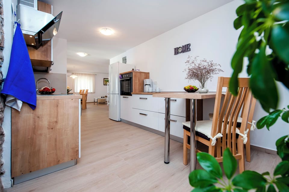 Villa | Private kitchen | Fridge, microwave, oven, stovetop