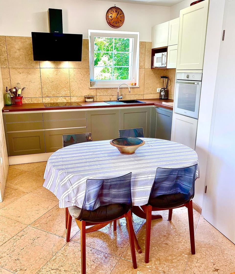 Villa | Private kitchen | Fridge, microwave, oven, stovetop