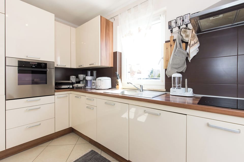 Villa | Private kitchen | Fridge, microwave, oven, stovetop