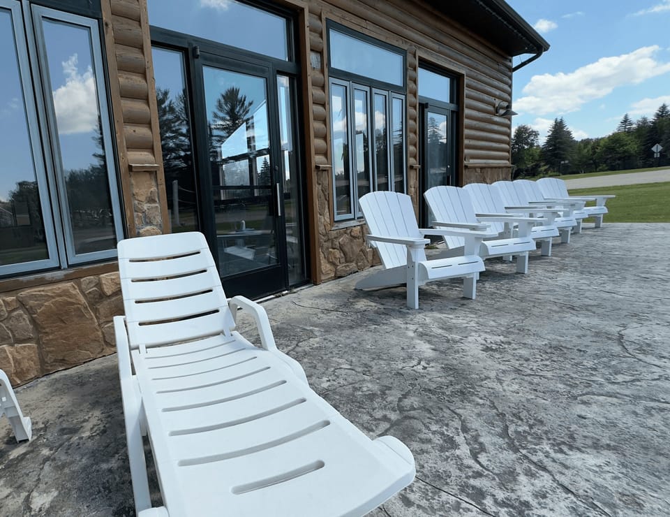 Lounge in sun chairs just steps from indoor comforts.