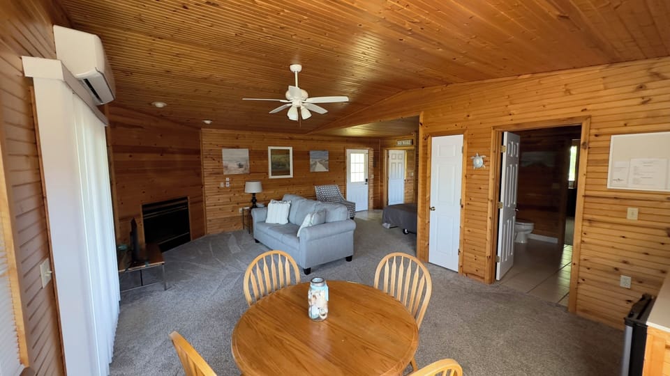 Gather after adventures in a warm lounge with dining table.