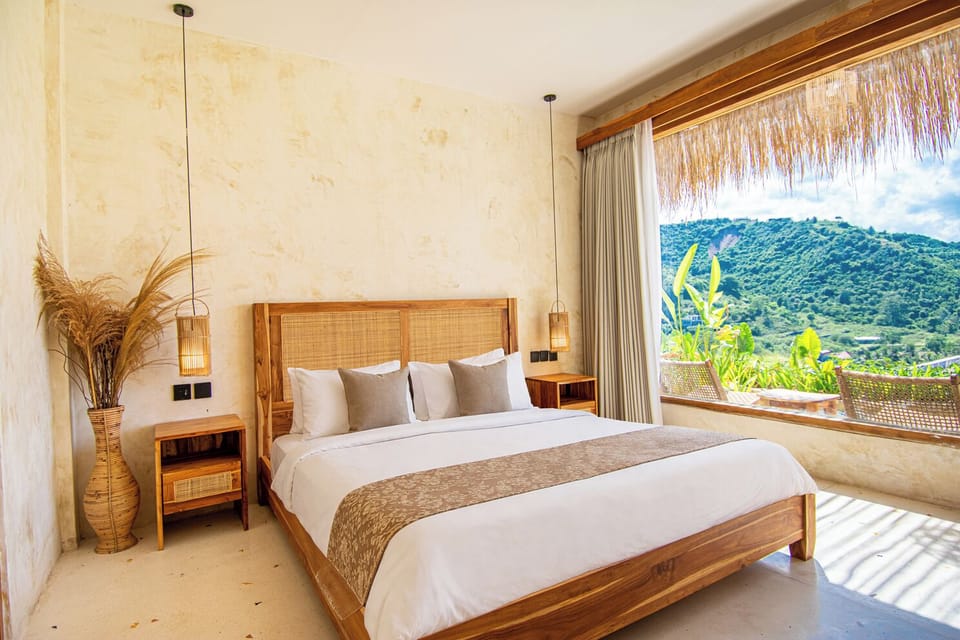 Deluxe Hillside Room | Minibar, in-room safe, desk, laptop workspace
