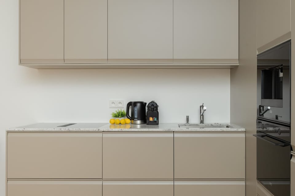 Cook and dine in style with the modern kitchenette and dining area.