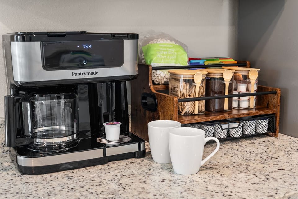 Guest-ready coffee station with stocked essentials and countertop convenience