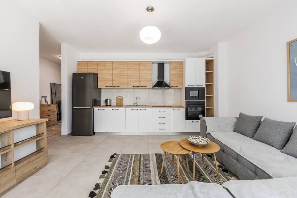 Living room and fully-equipped kitchen
