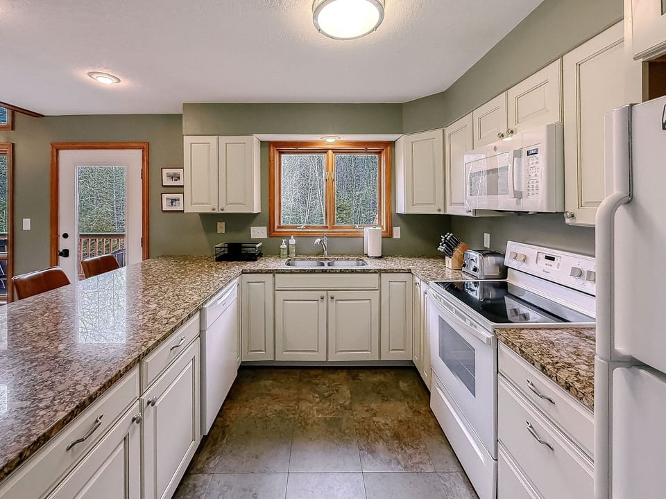Kitchen with stone counters