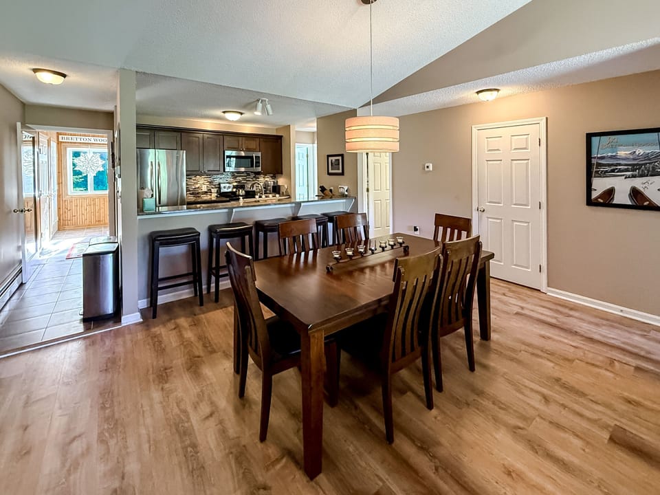 Dining area, looking towards the kitchen (in the background)