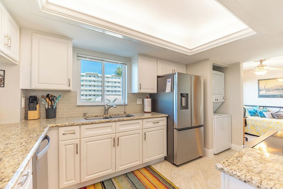 Fully Equipped Kitchen has all the appliances, dishware, cookware and tableware to entertain