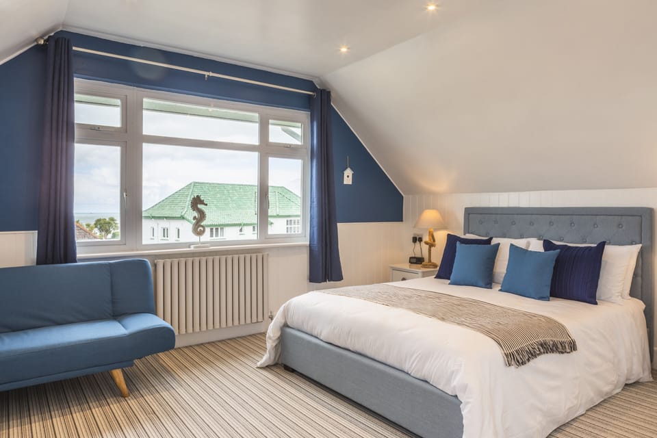 Family Room, Sea View | Individually decorated, individually furnished, iron/ironing board