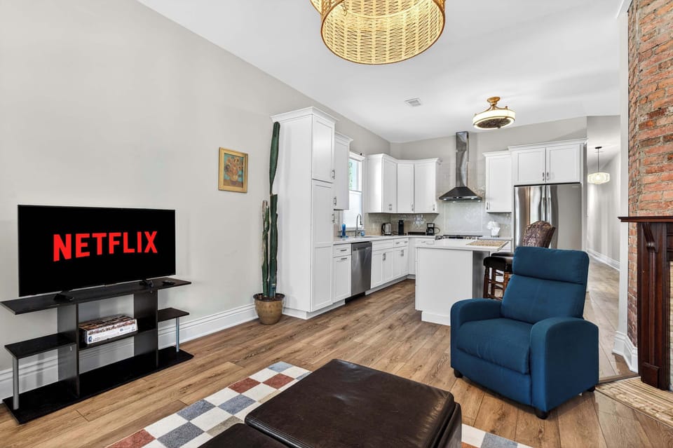 Living Room: Sink into the sectional and let the original-brick fireplace do the rest.