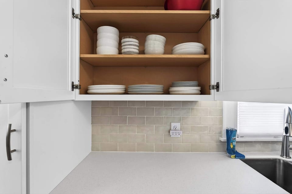 Kitchen: Bright, breezy, and stocked for everything from coffee runs to charcuterie nights.