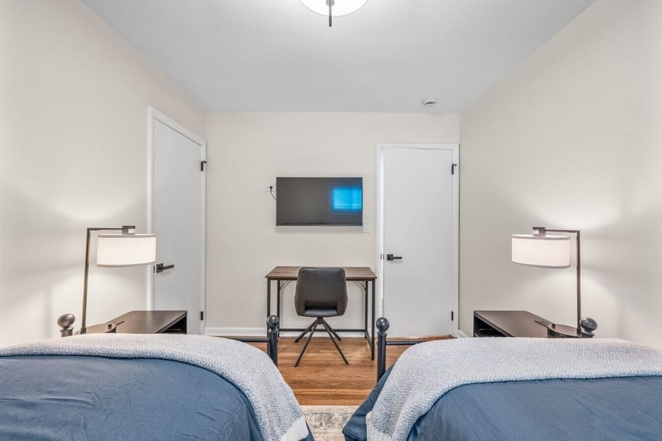 Bedroom 3 has a dedicated workspace and streaming app TV.