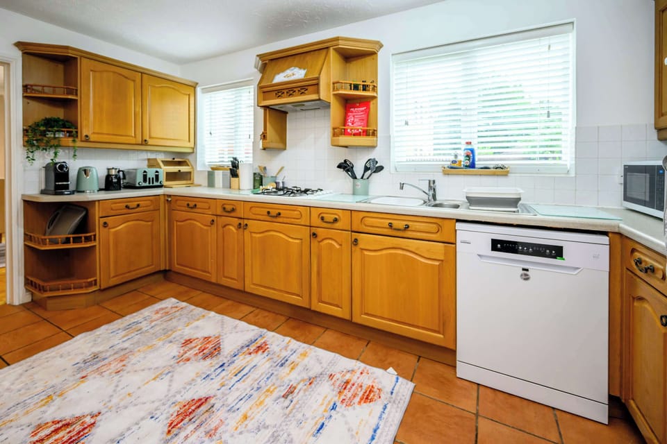 Cook with ease in our fully equipped kitchen. Features modern, full-sized appliances and is generously stocked with high-quality cookware, utensils, and dishware. Perfect for a quick breakfast or a gourmet dinner